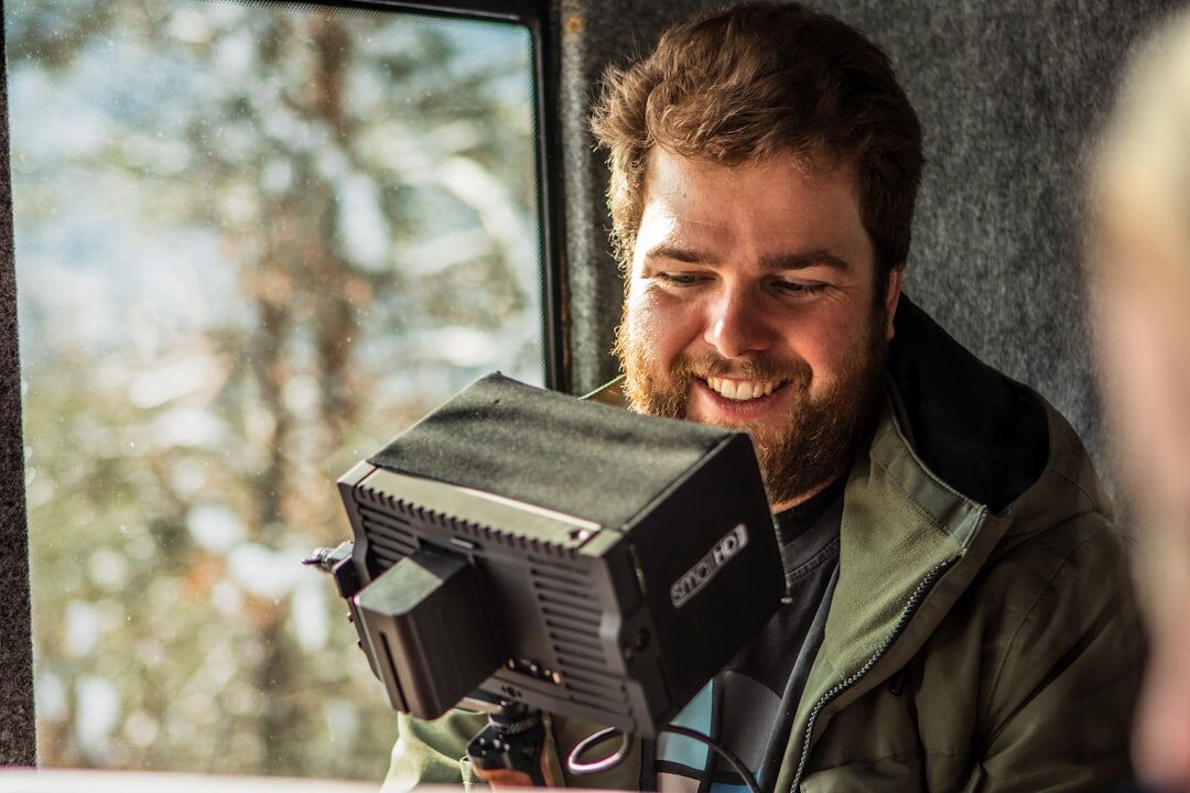 Finnish male instructor at a video switcher panel